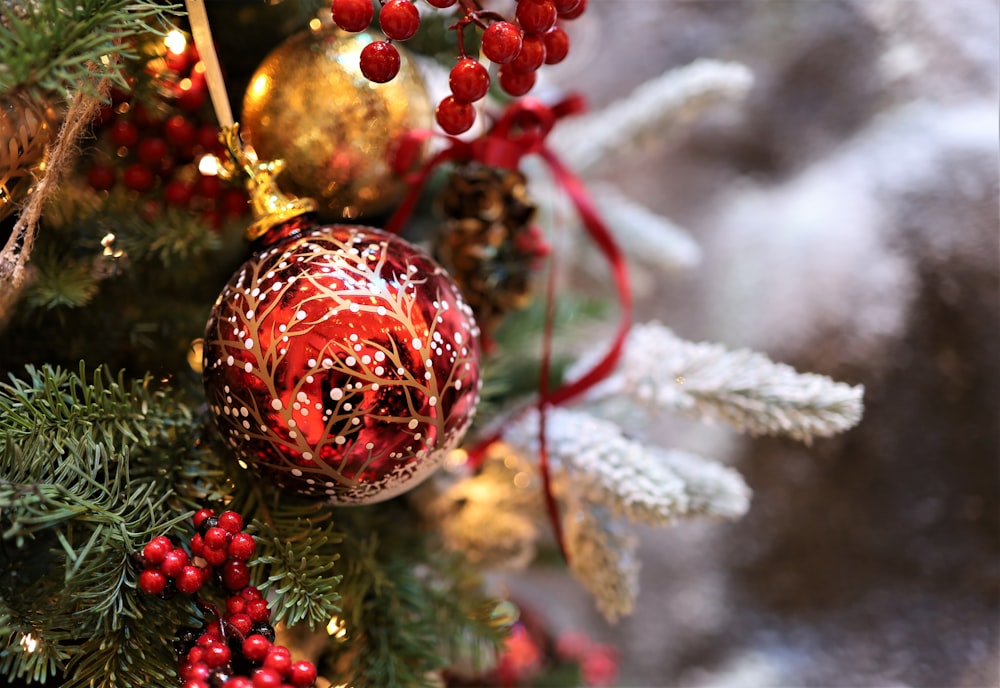 a close up of a christmas tree with ornaments