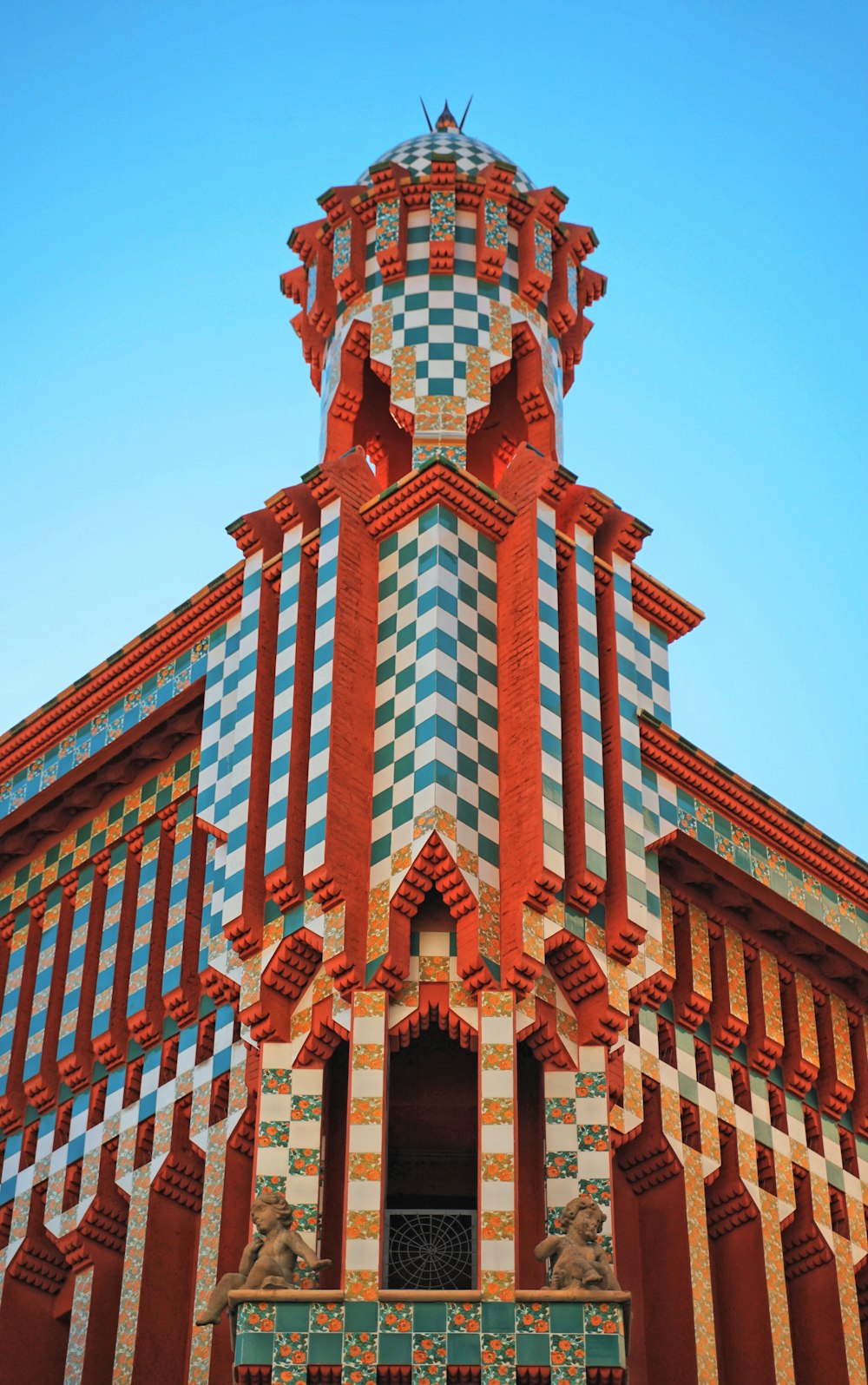 a tall building with a clock on the top of it