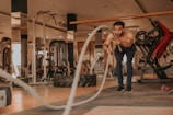 A male influencer demonstrating a high-intensity workout routine.
