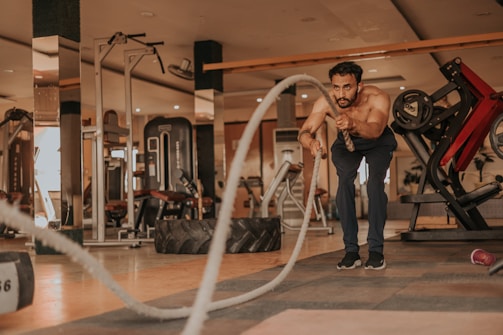 A male influencer demonstrating a high-intensity workout routine.