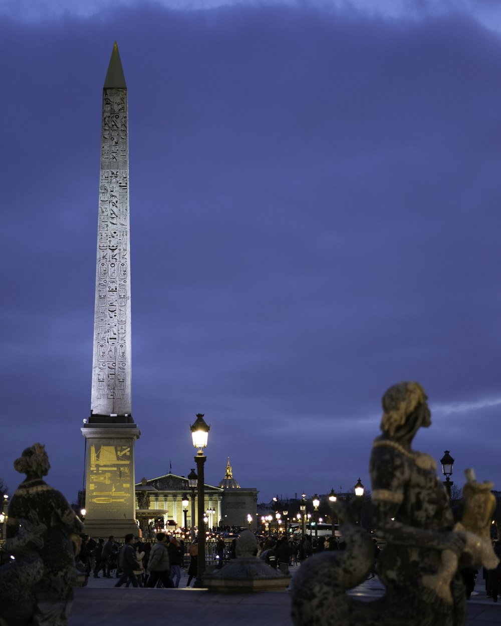 a large obelisk in the middle of a plaza