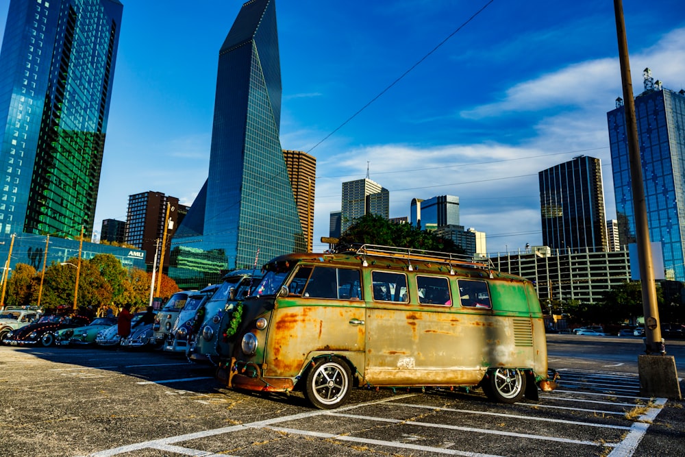 an old vw bus parked in a parking lot