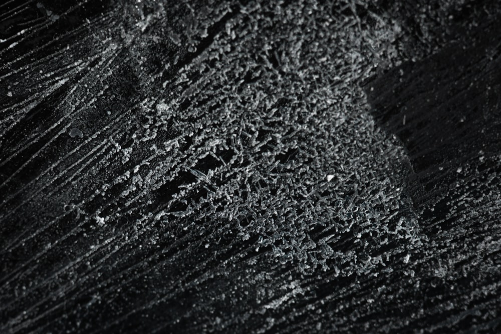 a close up of a black marble surface
