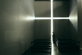 a person standing in a dimly lit room