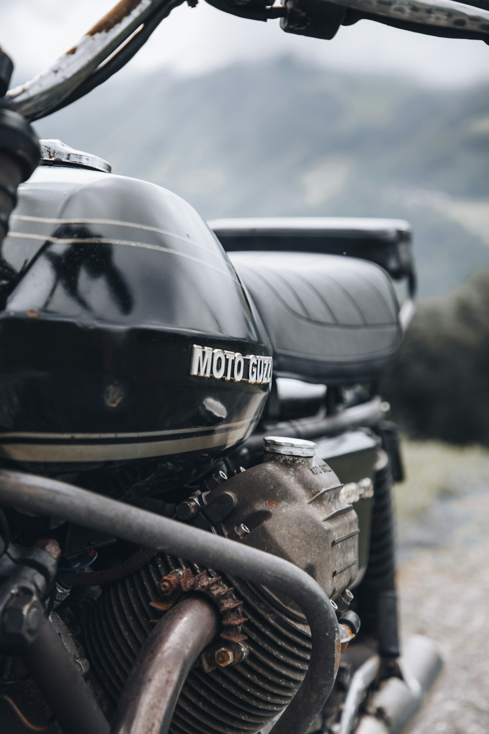 a motorcycle parked on the side of a road