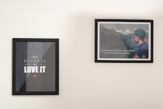 A bright, modern living room wall adorned with a bold motivational poster from Zukiy.