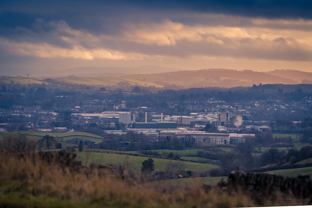 a view of a city from a hill