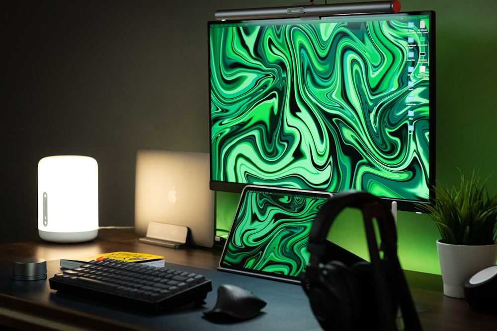 a computer monitor sitting on top of a desk