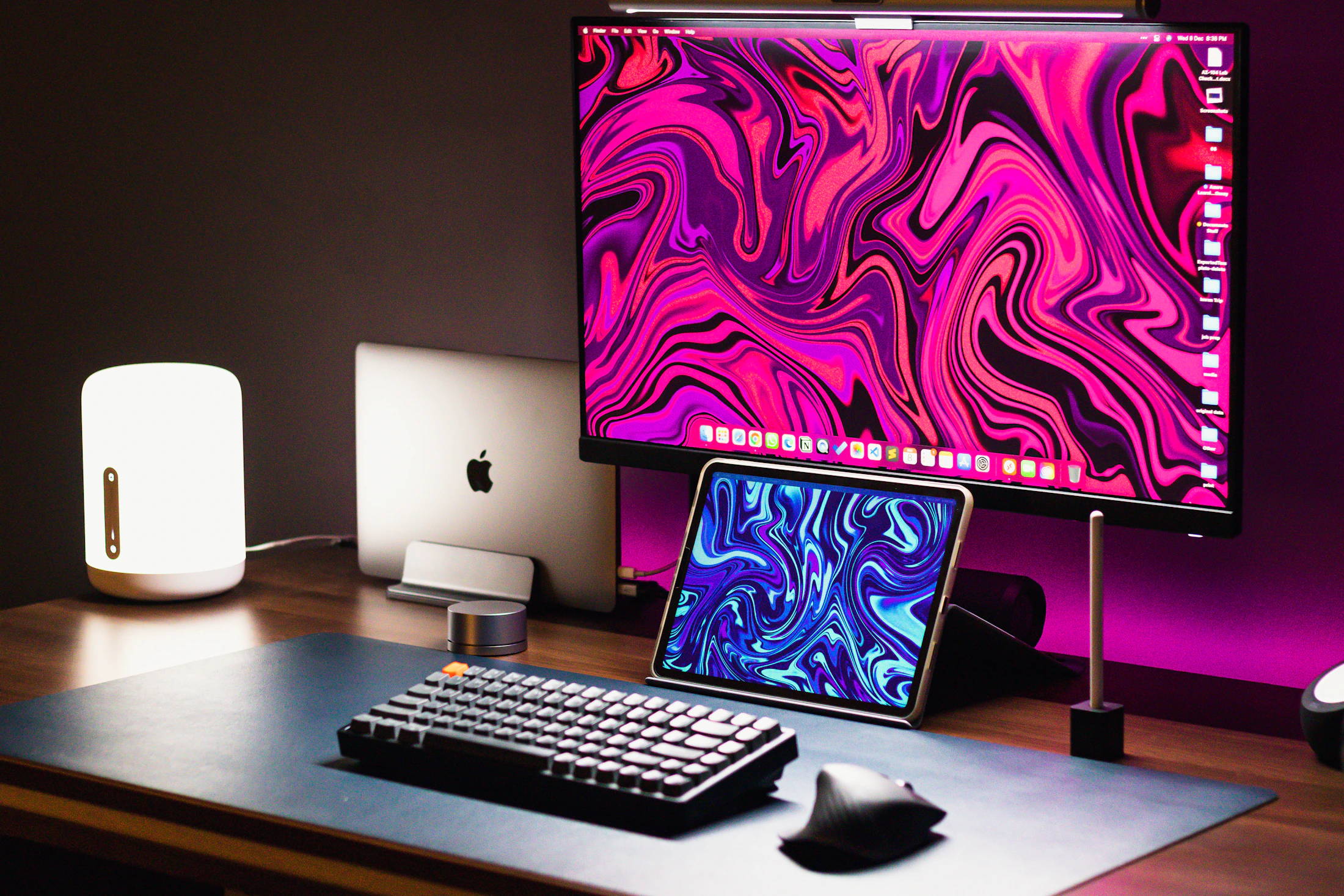 Minimal professional desk with monitor keyboard mouse and organized workspace