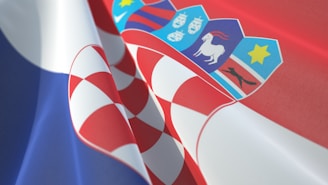 a close up of a red, white and blue flag