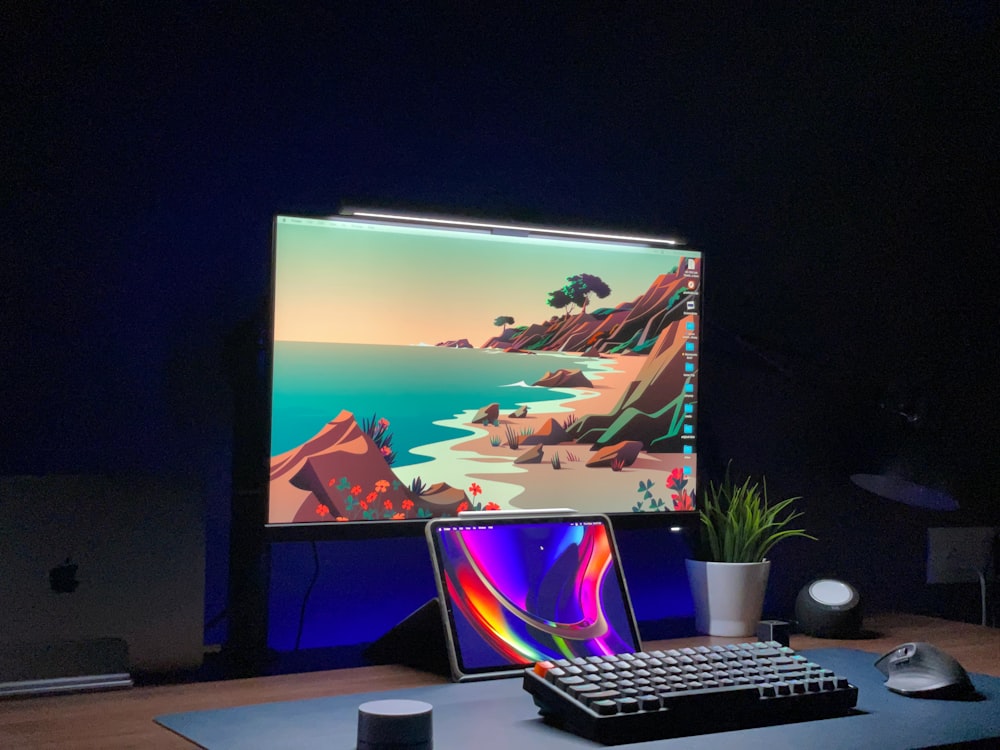 a laptop computer sitting on top of a wooden desk