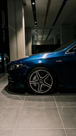 Close-up shot of a customer inspecting the interior of a car at Zaria Motors.
