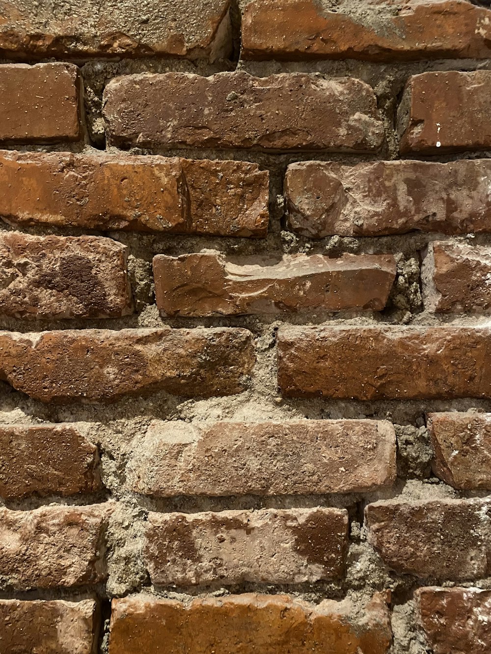 a close up of a brick wall made of bricks