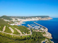 an aerial view of a marina with boats in the water