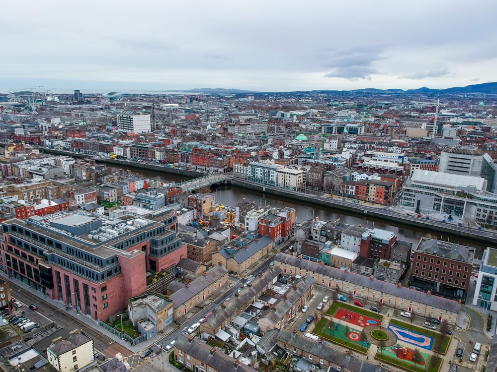 an aerial view of a city with lots of buildings