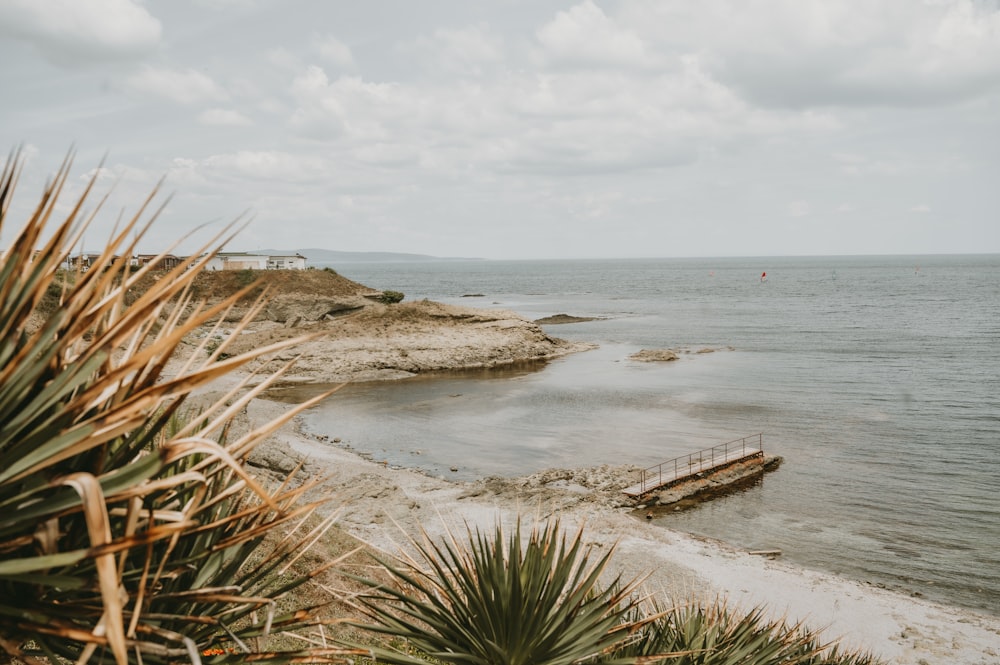 a view of a beach with a boat in the water