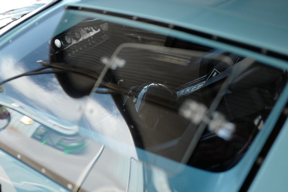 a close up of a car's dashboard with a sky background