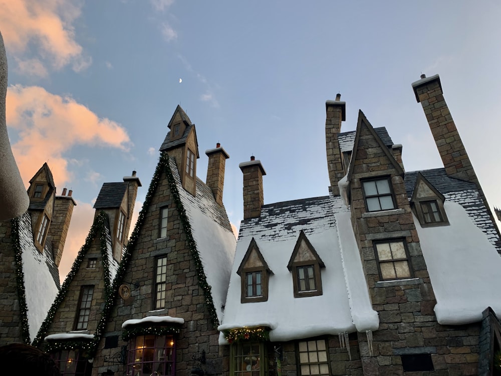 a group of buildings that are covered in snow