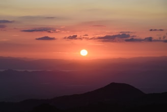 A vibrant sunset over the scenic Sonmarg valley.