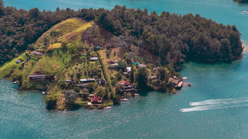 an aerial view of a small island in the middle of a lake