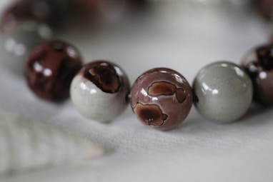 a close up of a bracelet with beads