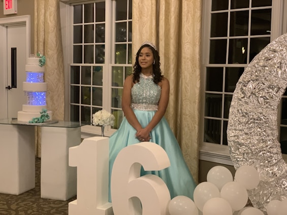 A stunning photograph of a quinceañera celebrating her special day.