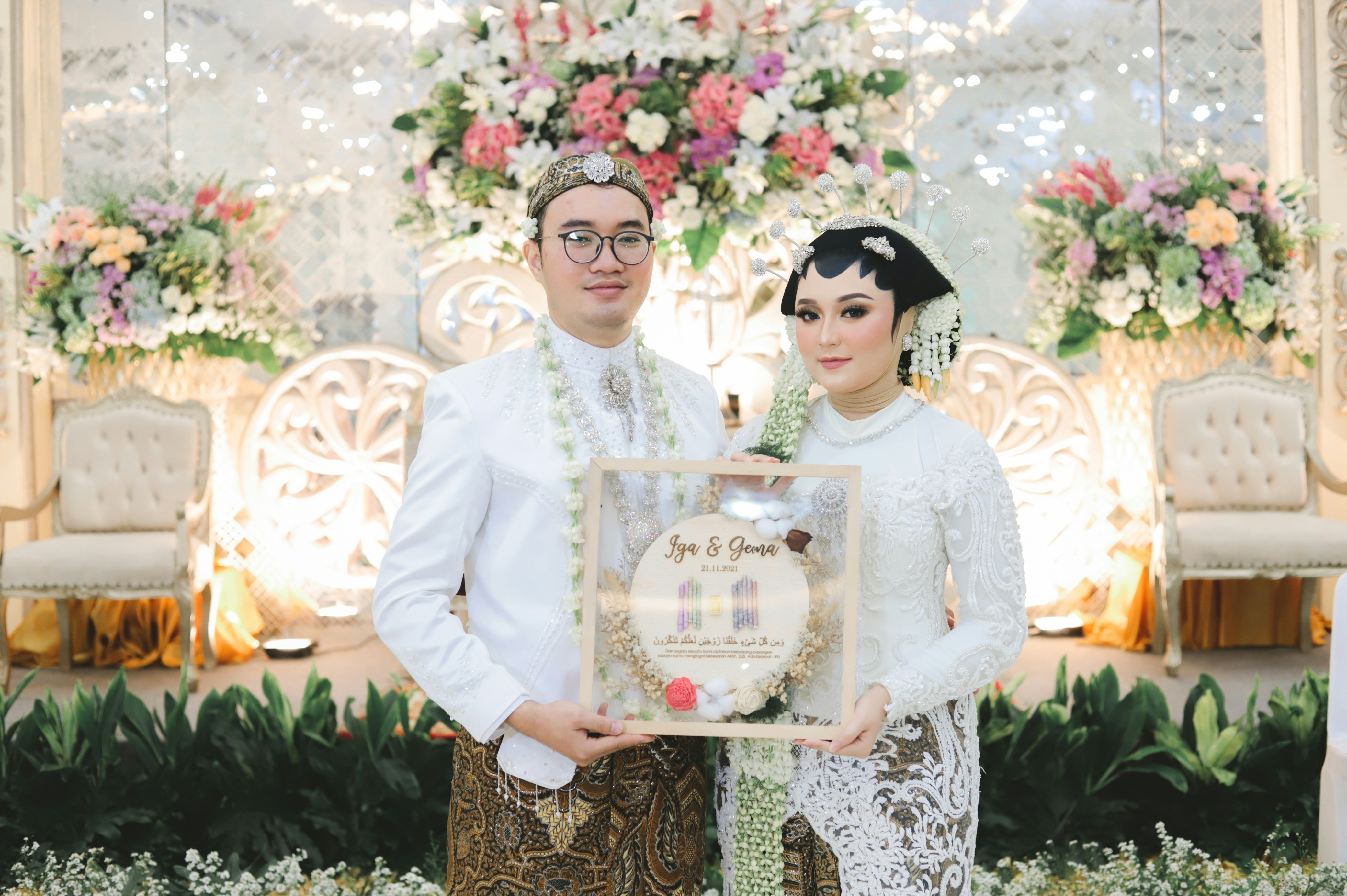 a man and a woman standing next to each other