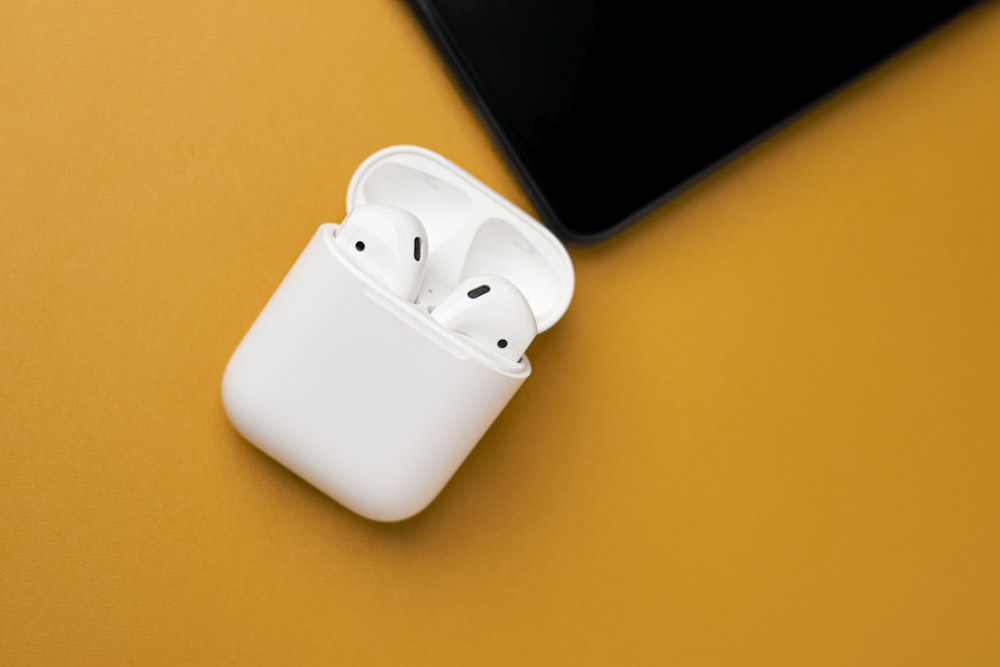 an apple airpods sitting on top of a table