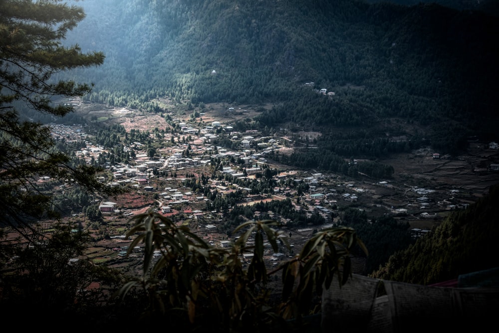 a view of a village in the mountains