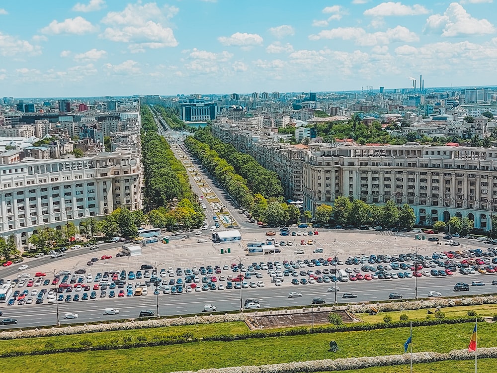 an aerial view of a parking lot in a city