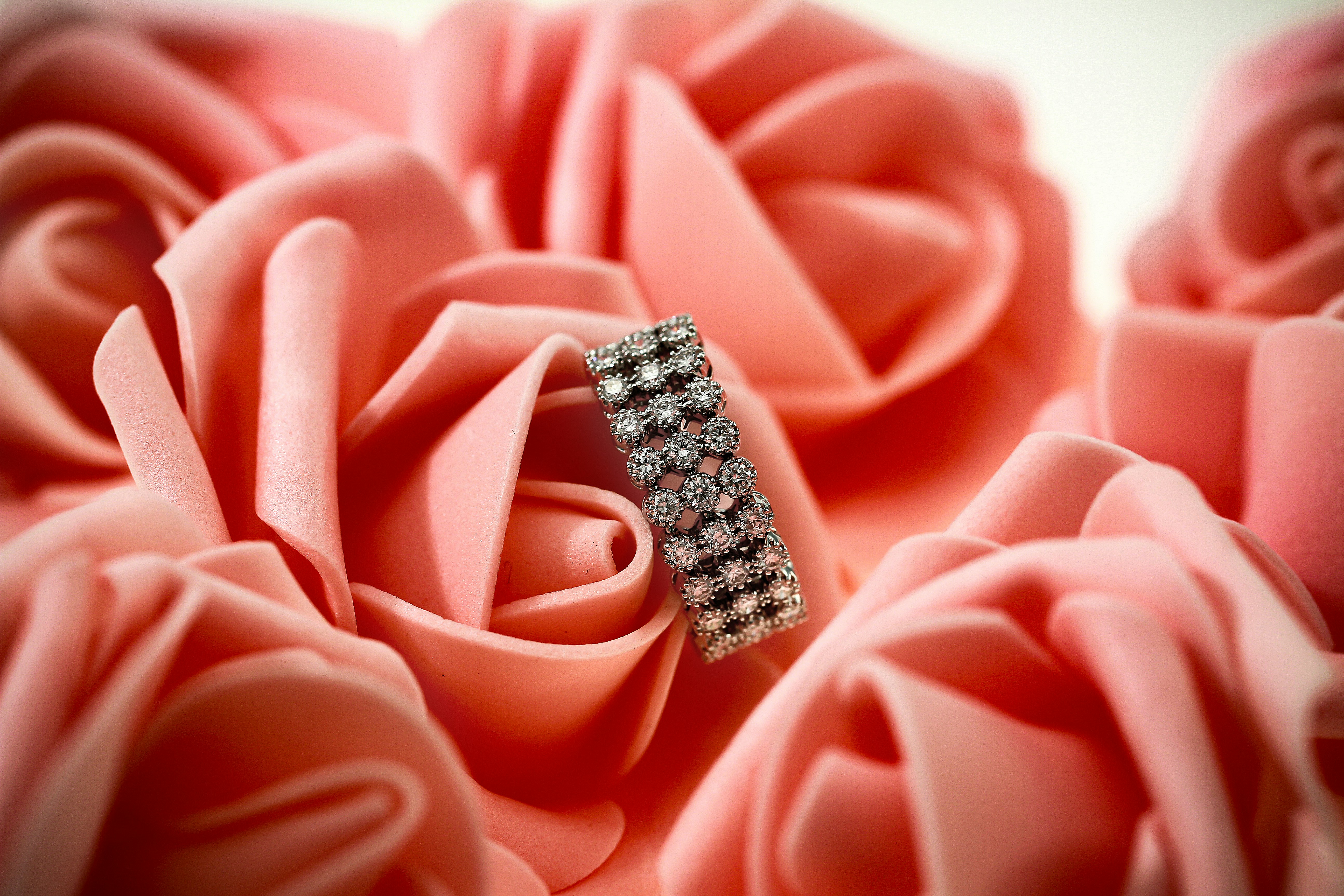 a close up of a ring on a flower