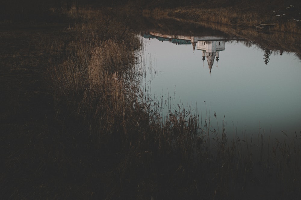 a boat sitting on top of a body of water