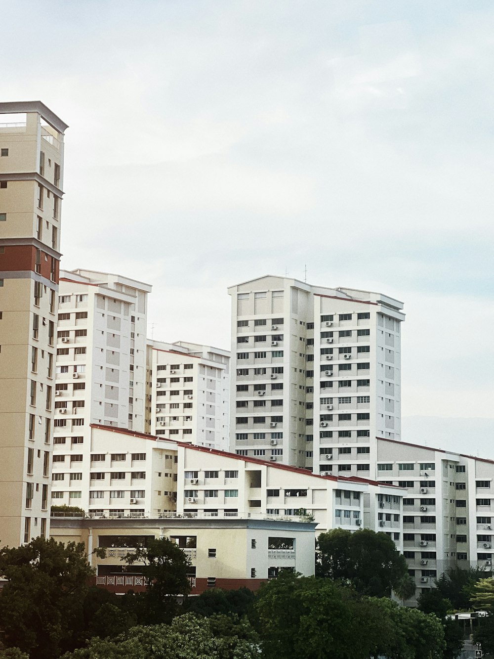 a group of tall buildings sitting next to each other