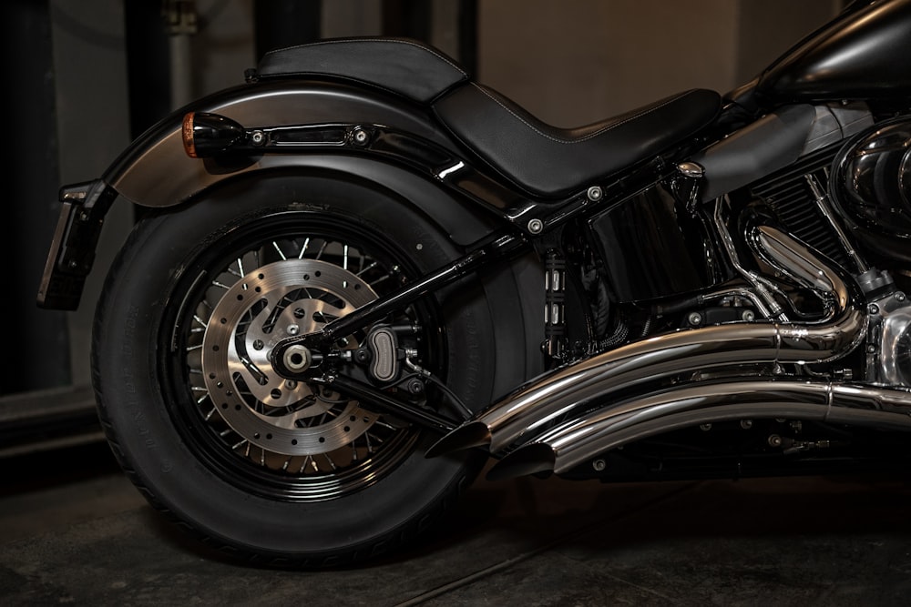 a close up of a motorcycle parked in a garage