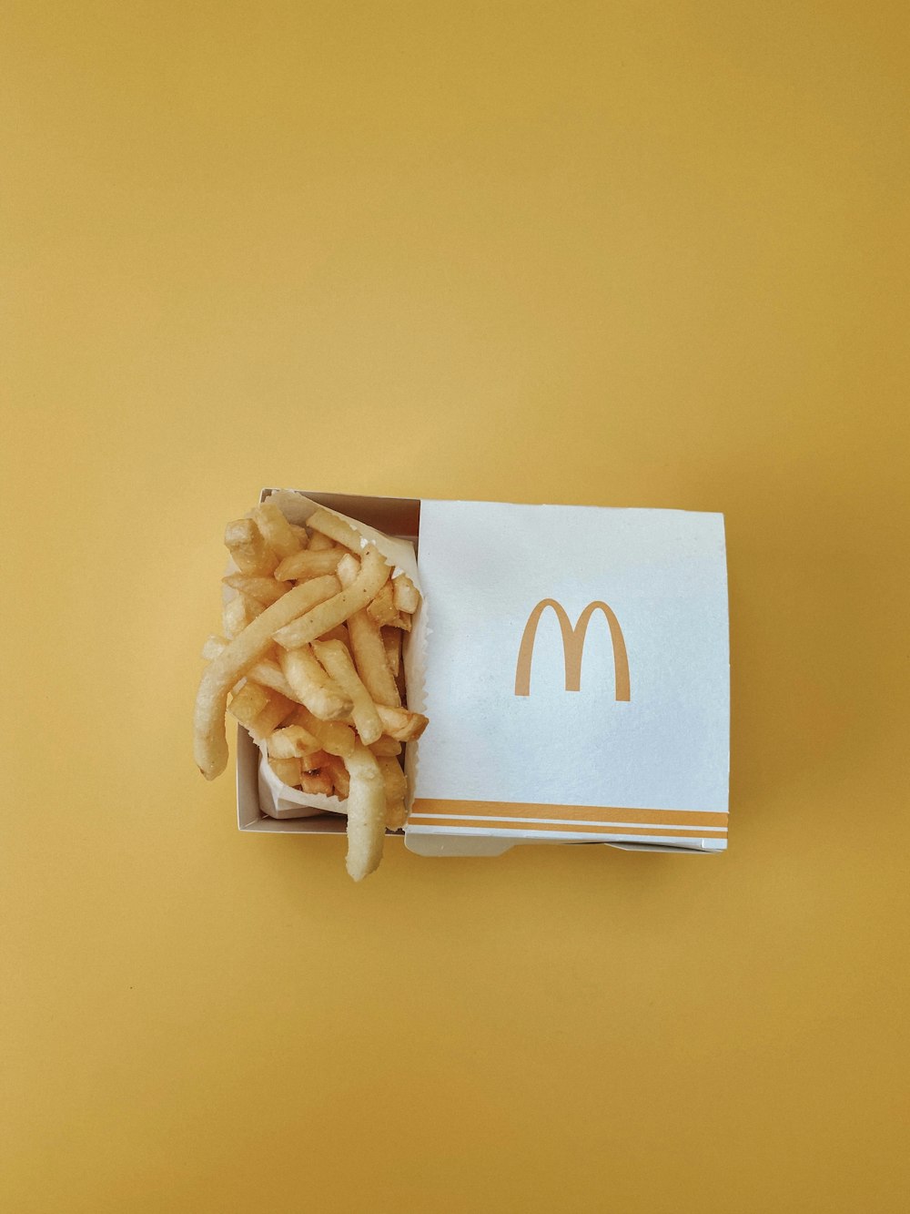 a box of french fries with a mcdonald's logo on it