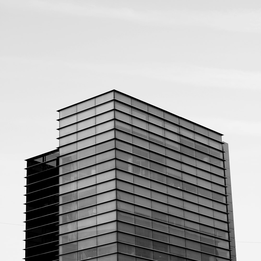 a black and white photo of a tall building