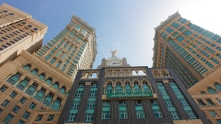 a large building with a clock on the top of it