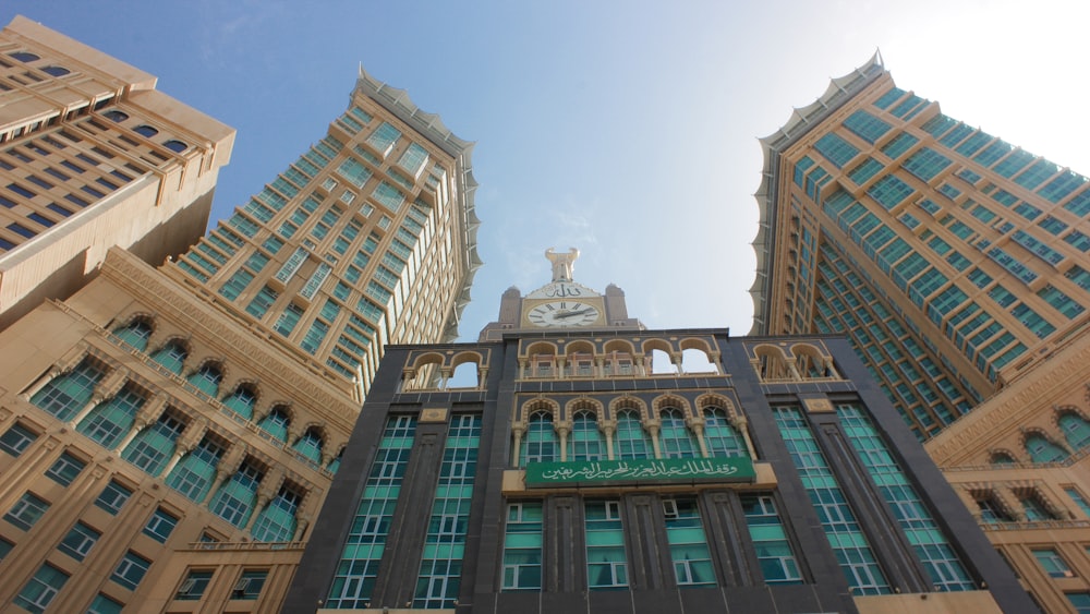 a large building with a clock on the top of it