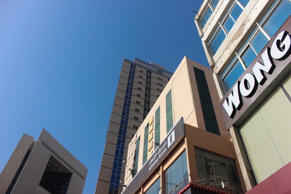 a tall building with a sign on the side of it