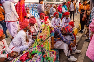 a group of people sitting next to each other