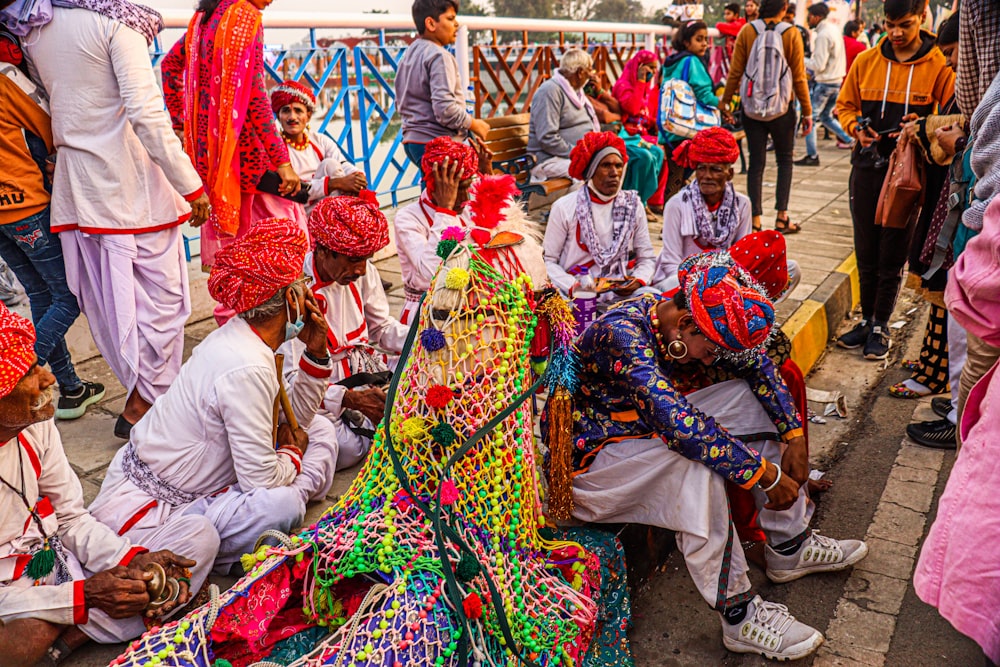 a group of people sitting next to each other