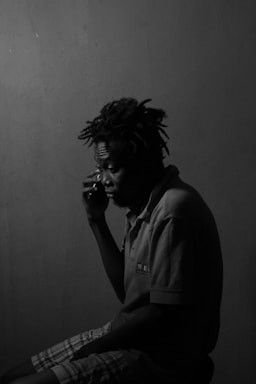 A serene image of a person making a phone call.