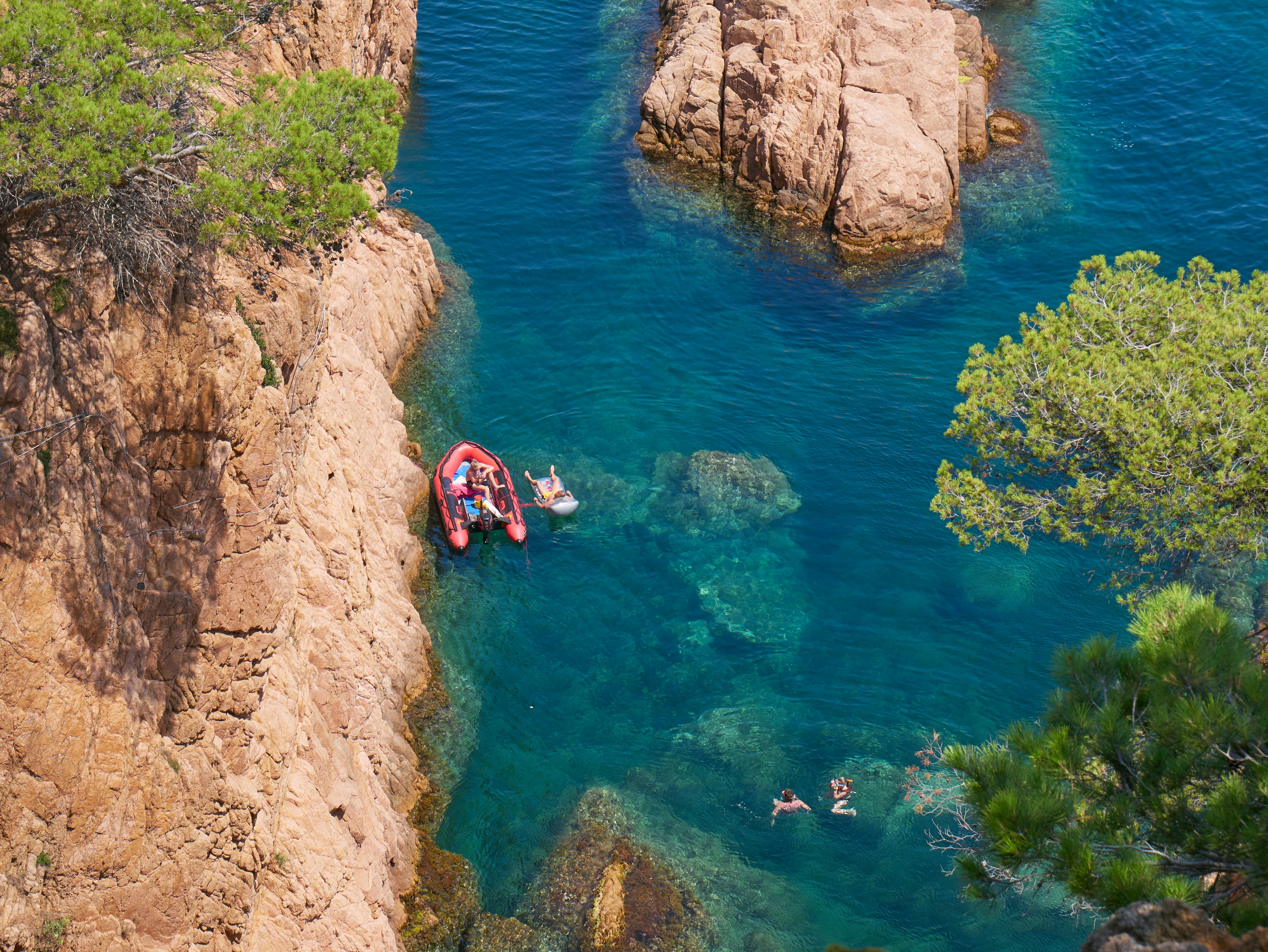 A Couple Of Boats Floating On Top Of A Body Of Water Photo Free Sant 