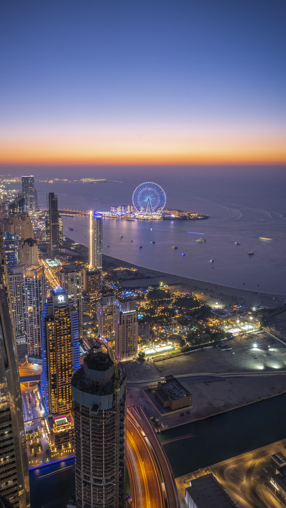 an aerial view of a city at night