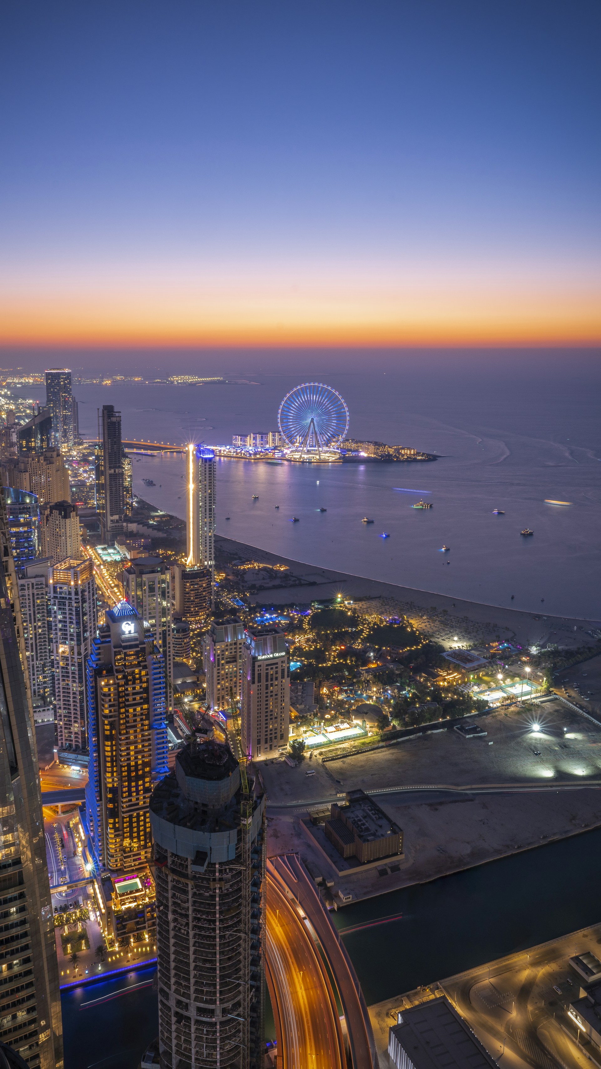 an aerial view of a city at night