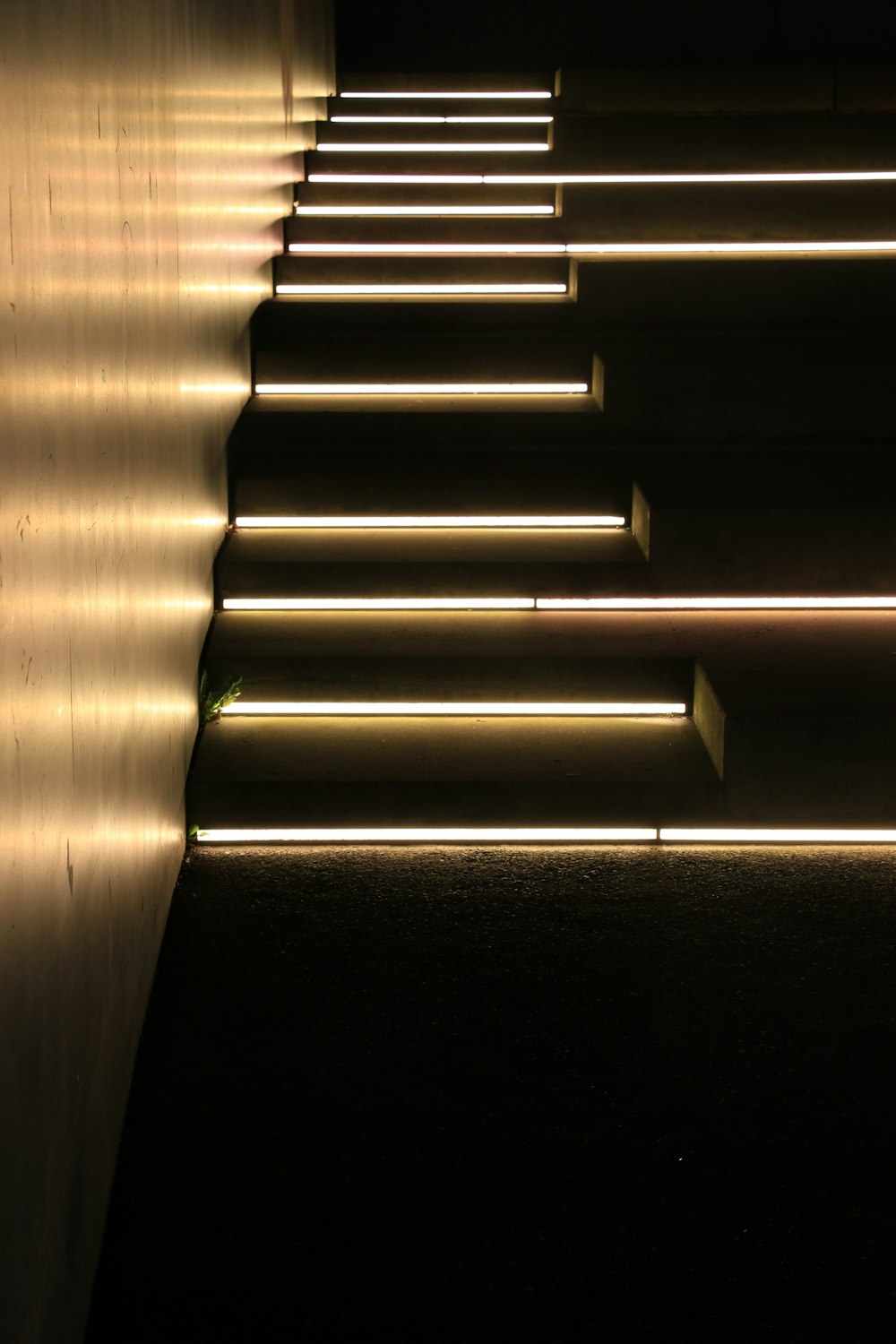 a set of stairs lit up with lights