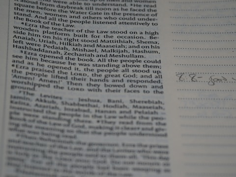 A page from a book or document with text printed in paragraphs. Lines and margins are visible with a faint handwritten note on the right.