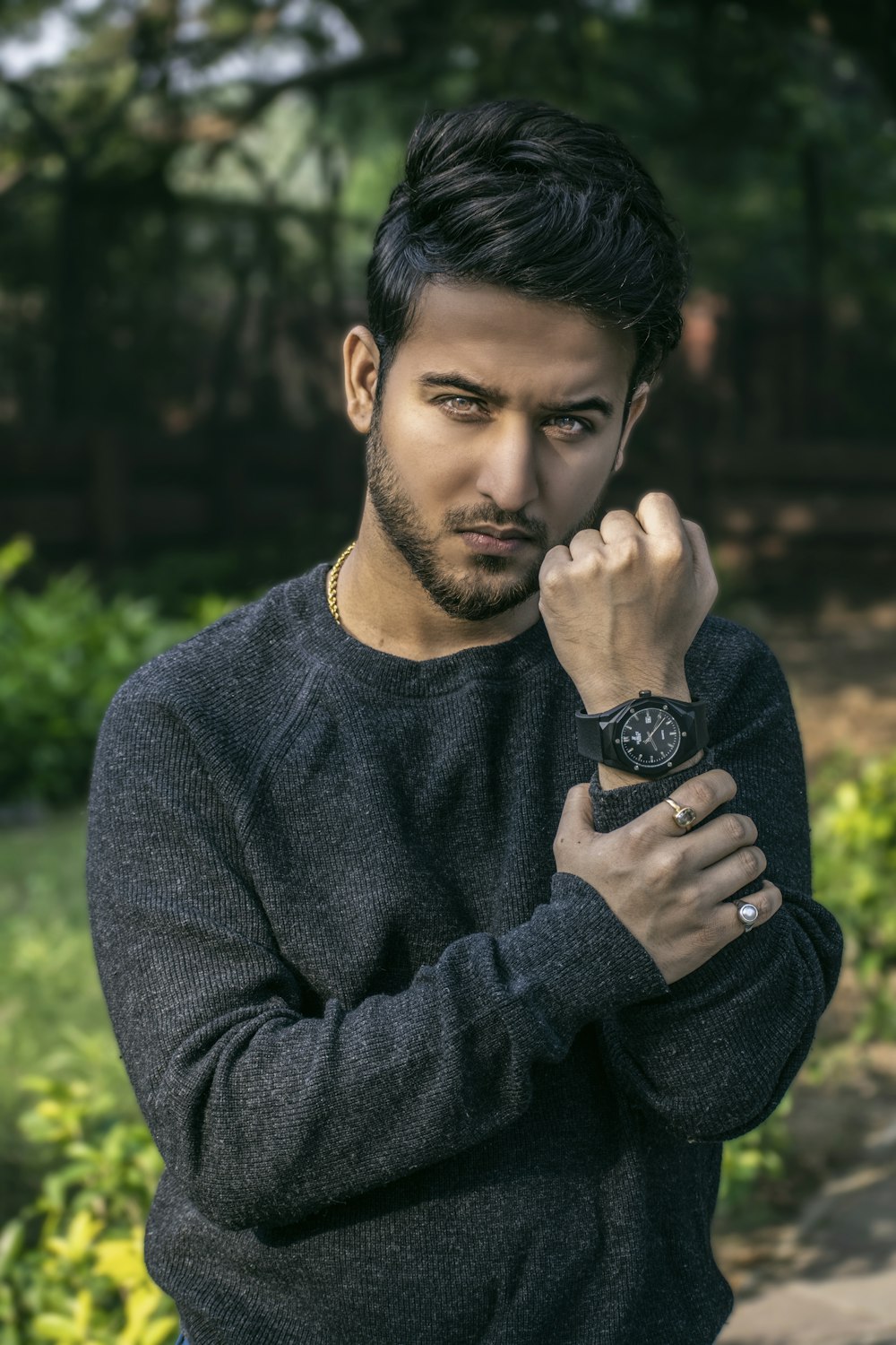 a man with a watch on his wrist