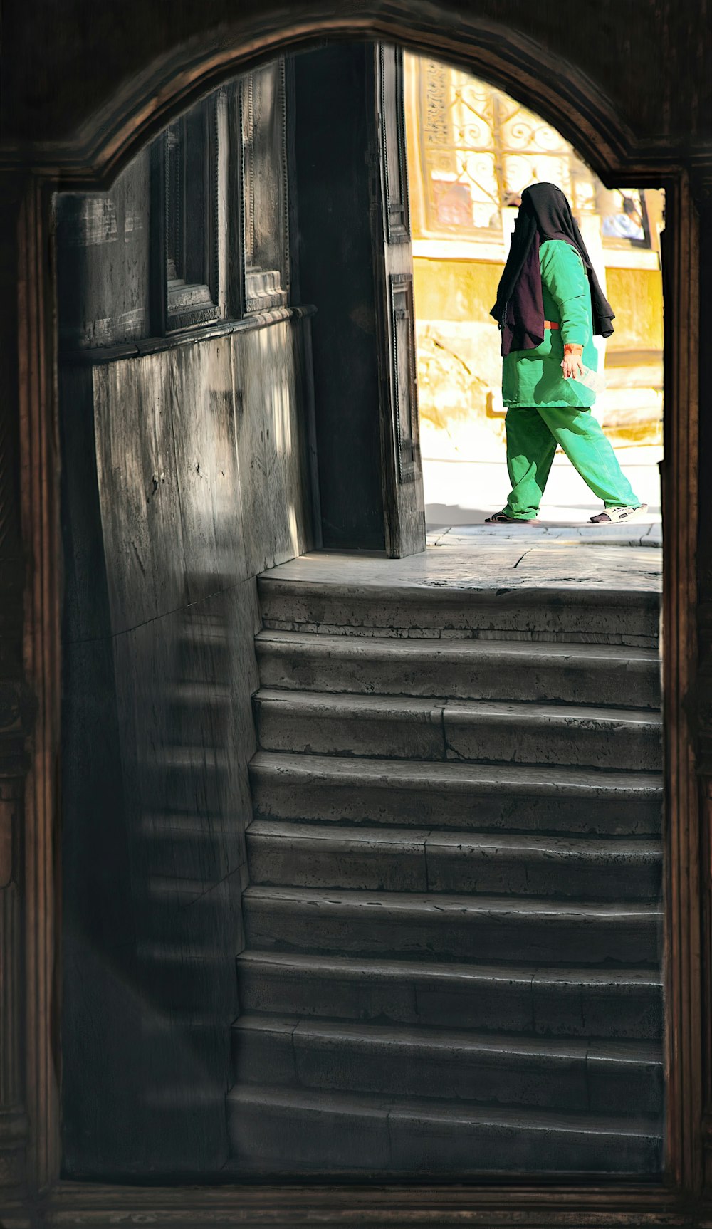 a person walking down a set of stairs