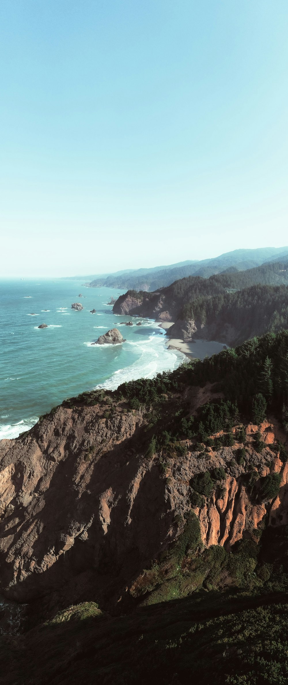 a scenic view of the ocean from a cliff